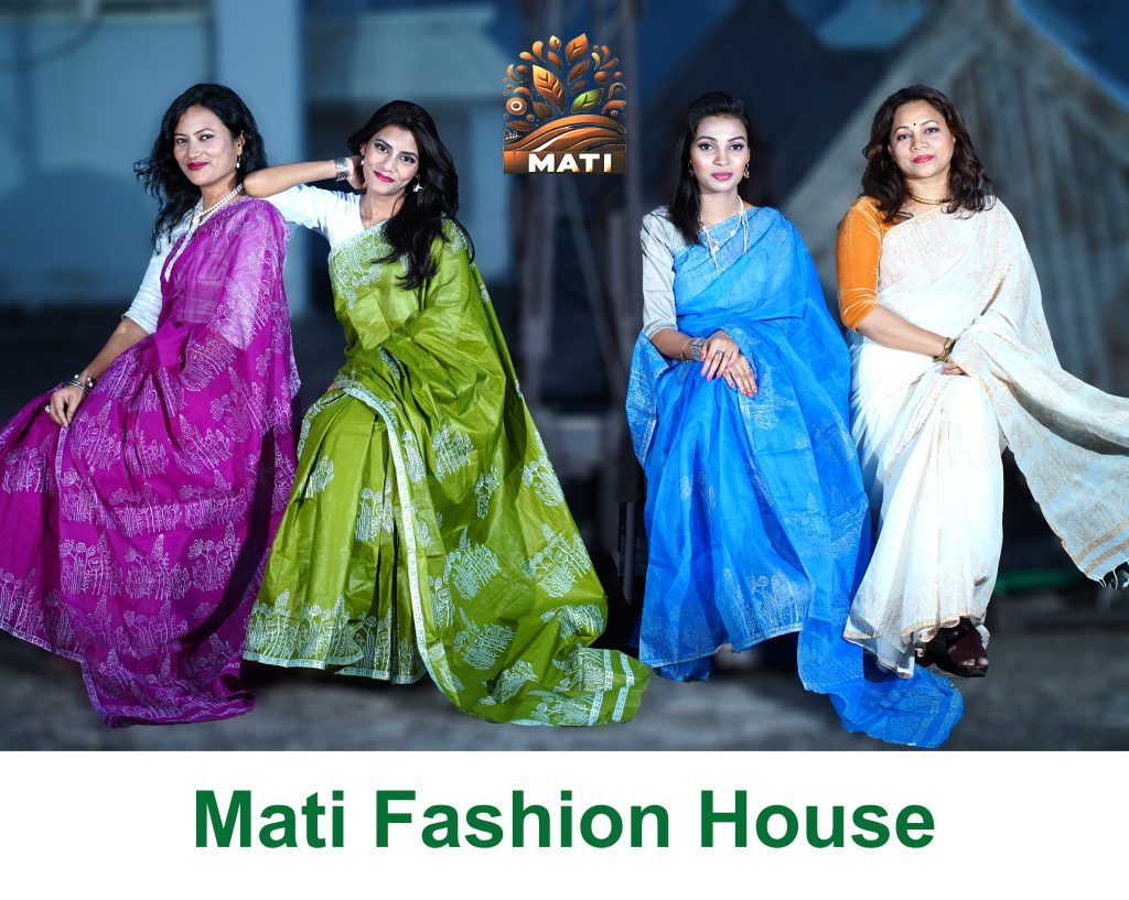 Four elegant women wearing colorful traditional sarees from Mati Fashion House.